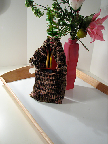 Woven purse in teaparty