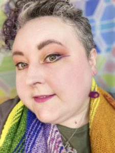 Rainbow eyeliner to go with a rainbow shawl!